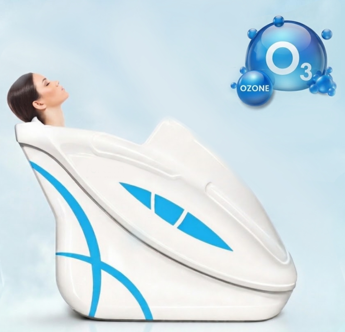 Guest relaxing in the HealthSphere ozone (O₃) sauna capsule